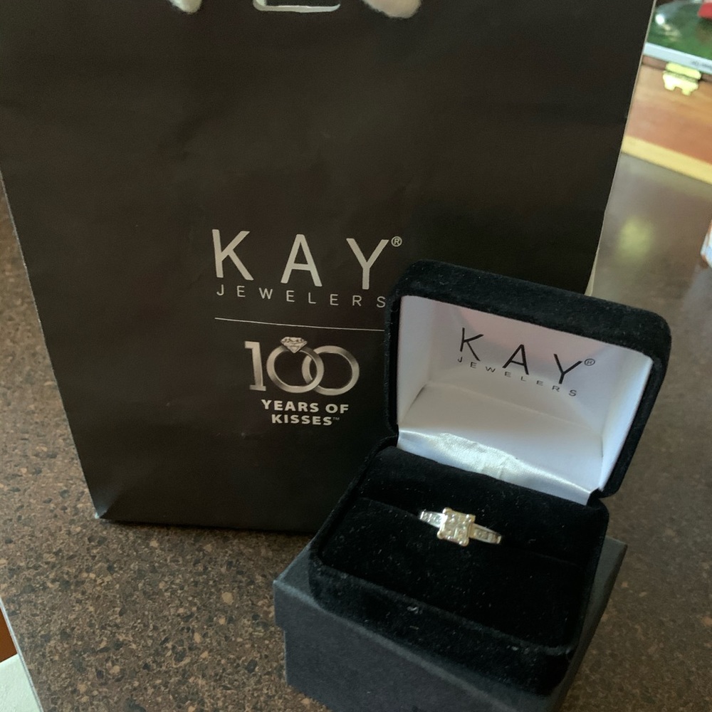 Last chance  multi faceted princess diamond ring